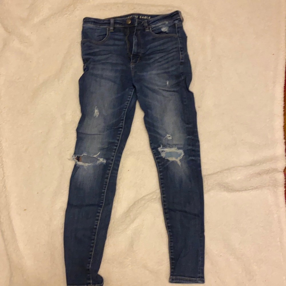 American Eagle jeans with rips on knee